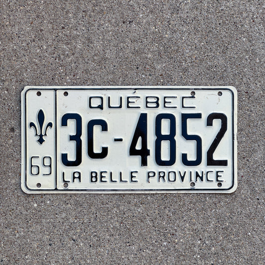 Photo of a 1969 Quebec License Plate Auto Tag Garage Decor Vintage 3C 4852 with original patina