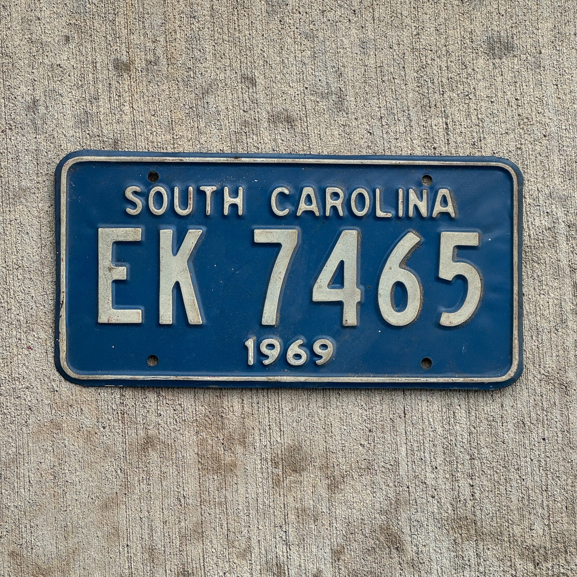 Photo of a 1969 South Carolina License Plate Auto Tag Garage Decor Vintage EK 7465 with original patina