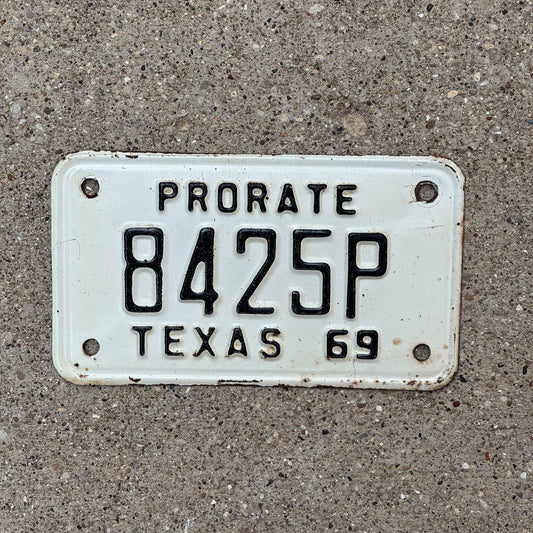 Photo of a 1969 Texas Prorate License Plate Auto Tag Garage Decor Vintage 8425 P with original patina
