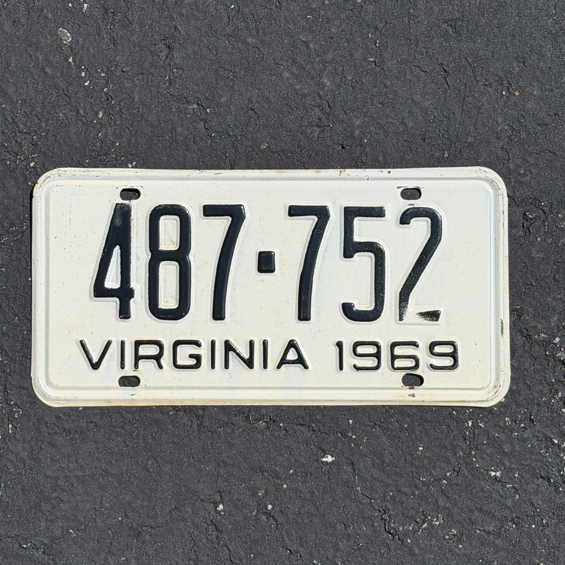Photo of a 1969 Virginia License Plate Auto Tag Garage Decor Vintage 487 752 with original patina