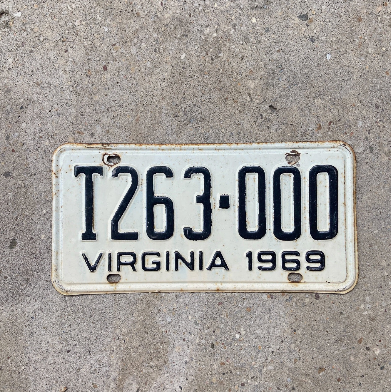 Photo of a 1969 Virginia Truck License Plate Auto Tag Garage Decor Vintage Repeat Repeating T 263 000 with original patina