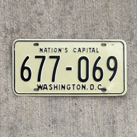 Photo of a 1969 Washington DC License Plate Auto Tag Garage Decor Vintage 677 069 with original patina