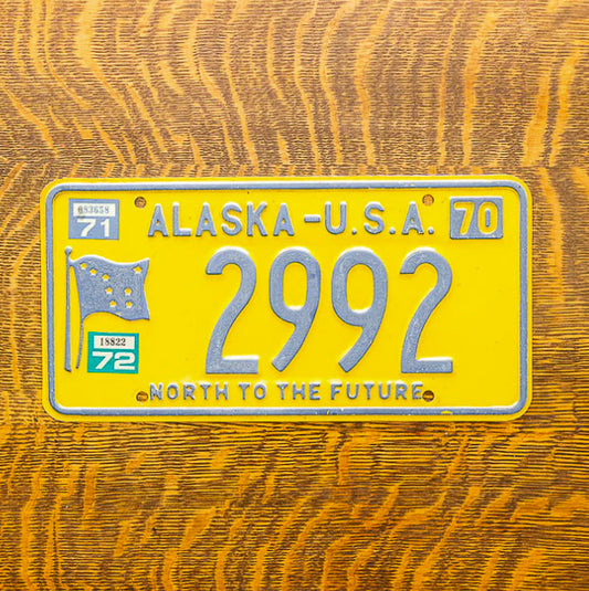 Photo of a 1970 1971 Alaska License Plate Auto Tag Garage Decor Vintage Four Digit Low Number 2992 with original patina