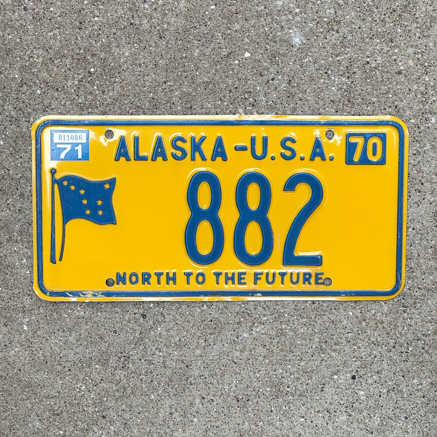 Photo of a 1970 1971 Alaska License Plate Auto Tag Garage Decor Vintage Low Number Three Digit 882 with original patina