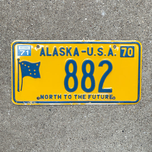 Photo of a 1970 1971 Alaska License Plate Auto Tag Garage Decor Vintage Low Number Three Digit 882 with original patina