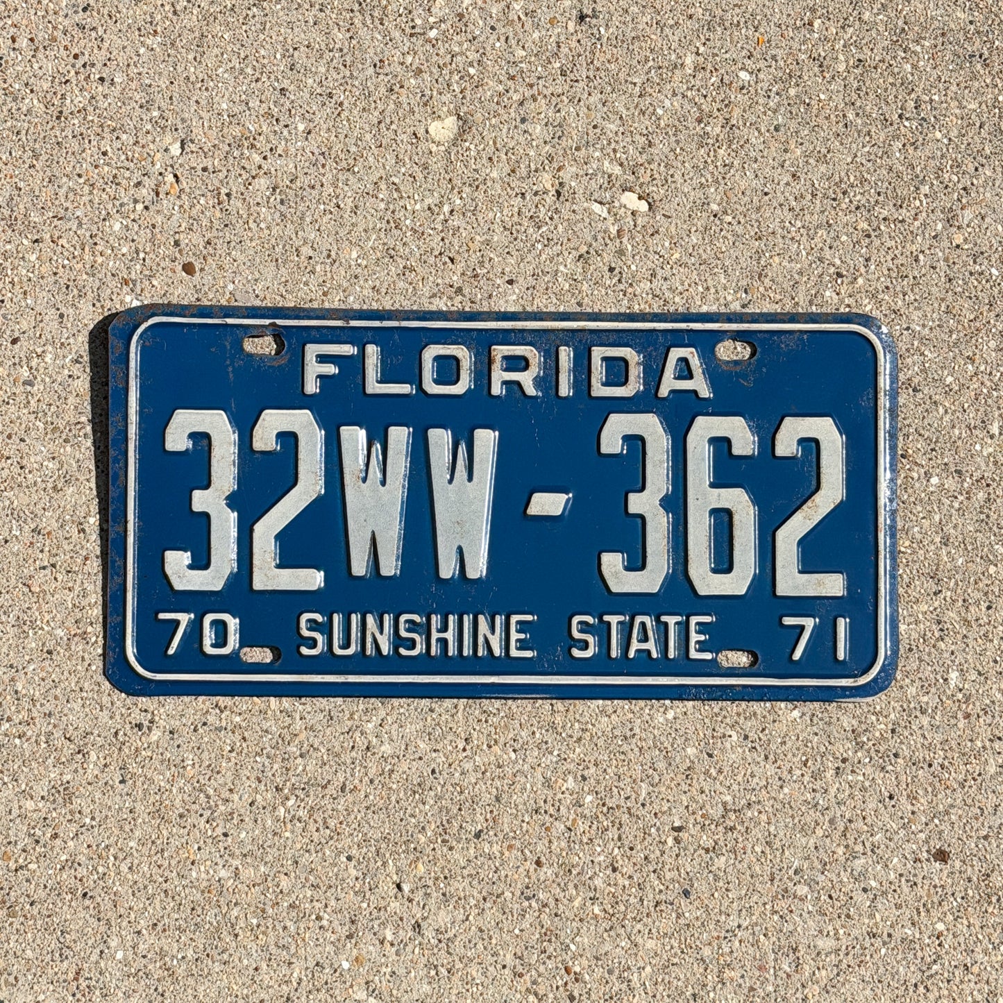 Photo of a 1970 1971 Florida License Plate Auto Tag Garage Decor Vintage 32 WW 362 with original patina