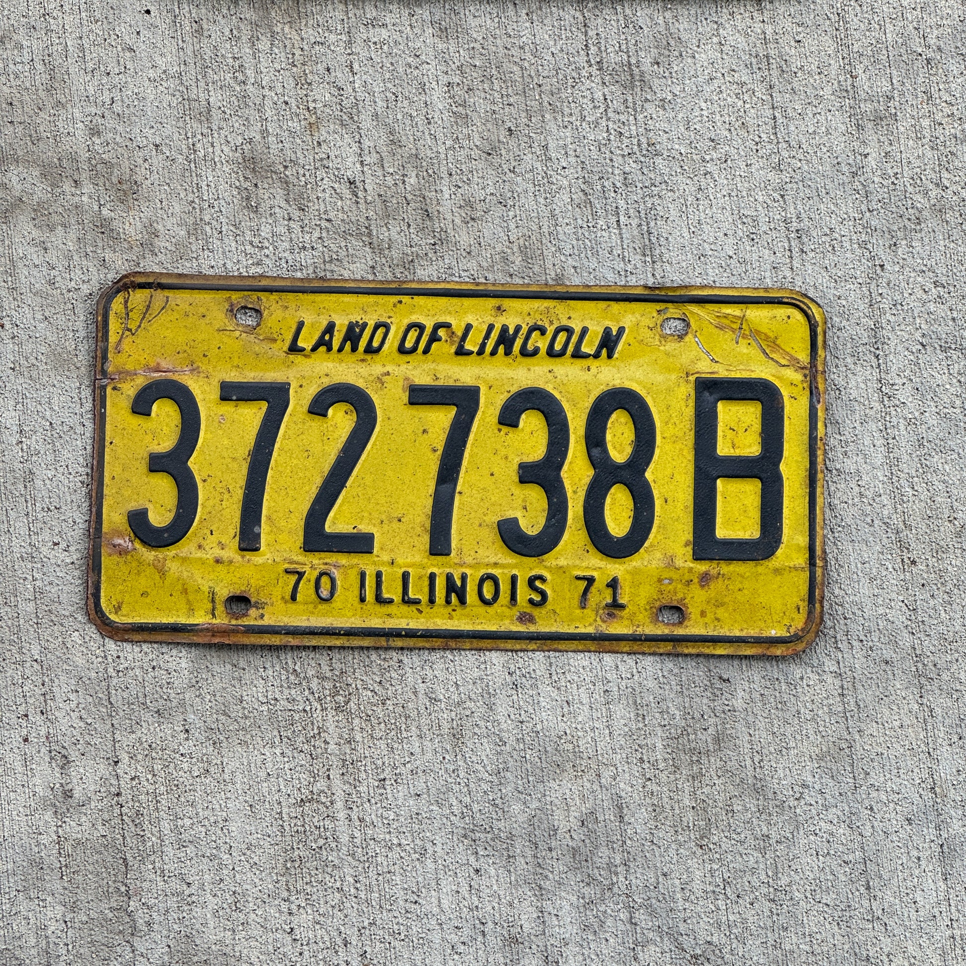 Photo of a 1970 1971 Illinois Truck License Plate Auto Tag 1 Vintage Garage 372 738 B with original patina