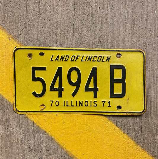Photo of a 1970 1971 Illinois Truck License Plate Auto Tag Garage Decor Vintage 5494 B with original patina