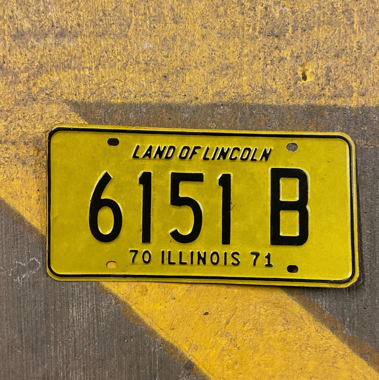 Photo of a 1970 1971 Illinois Truck License Plate Auto Tag Garage Decor Vintage 6151 B with original patina