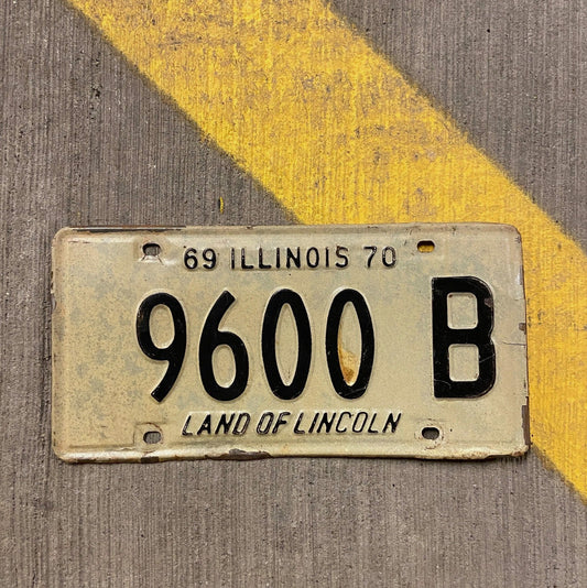 Photo of a 1970 1971 Illinois Truck License Plate Auto Tag Garage Decor Vintage 9600 B with original patina