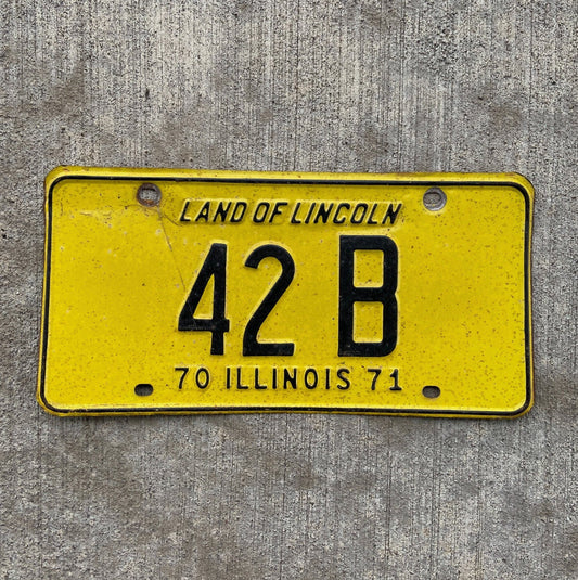 Photo of a 1970 1971 Illinois Truck License Plate Auto Tag Garage Decor Vintage Low Number Two Digit 42 B with original patina