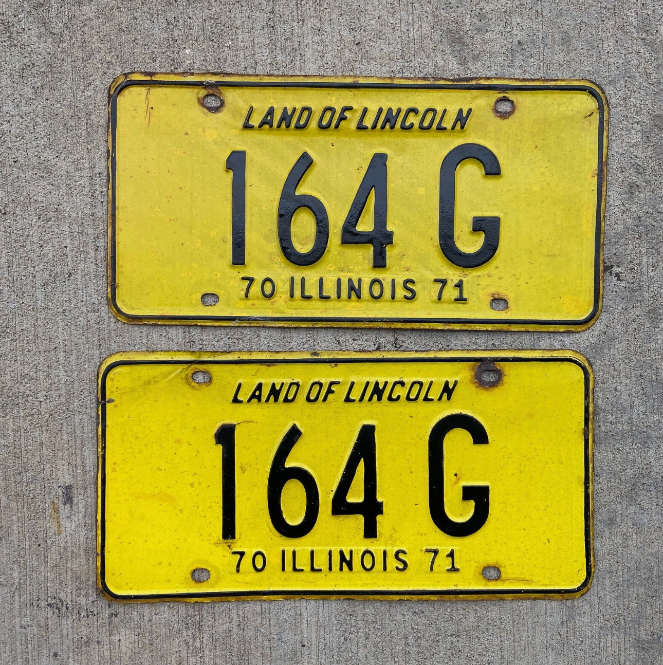 Photo of a 1970 1971 Illinois Truck License Plate Pair Auto Tag Garage Decor Vintage 164 G with original patina