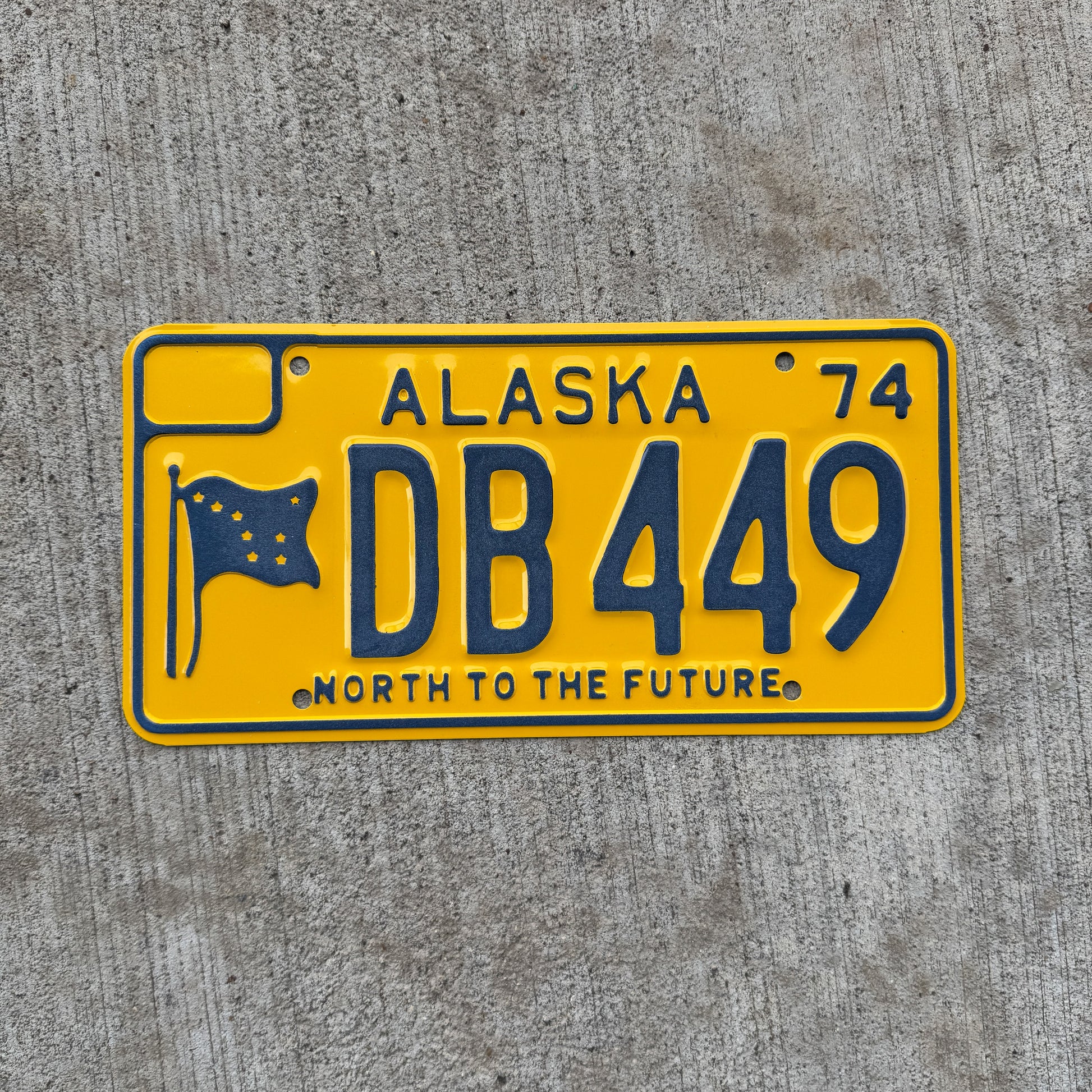 Photo of a 1970 1974 Alaska License Plate Auto Tag Garage Decor Vintage DB 449 with original patina