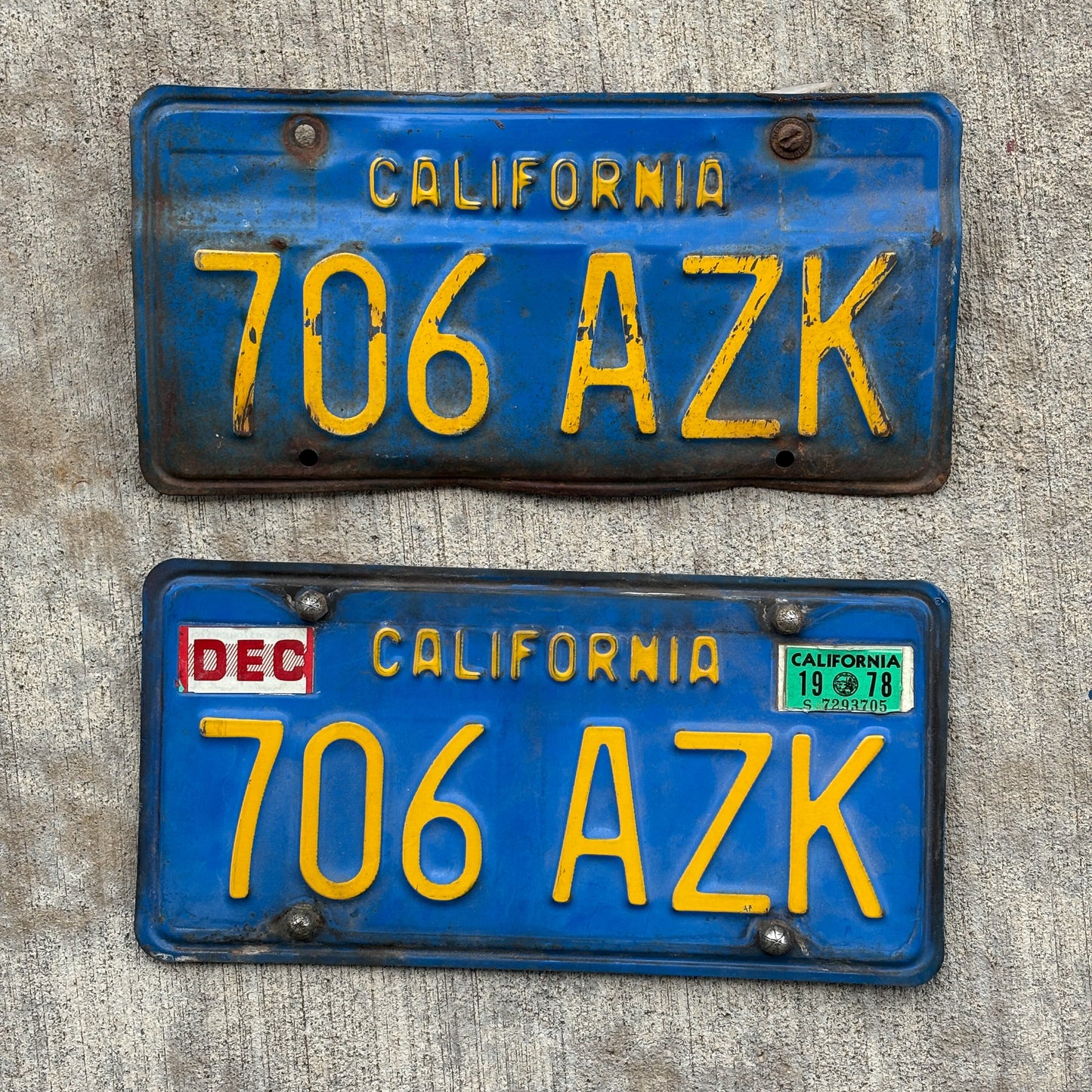 Photo of a 1970 1978 California Pair Auto Tag Garage Decor Vintage DMV Clear Number 706 AZK with original patina