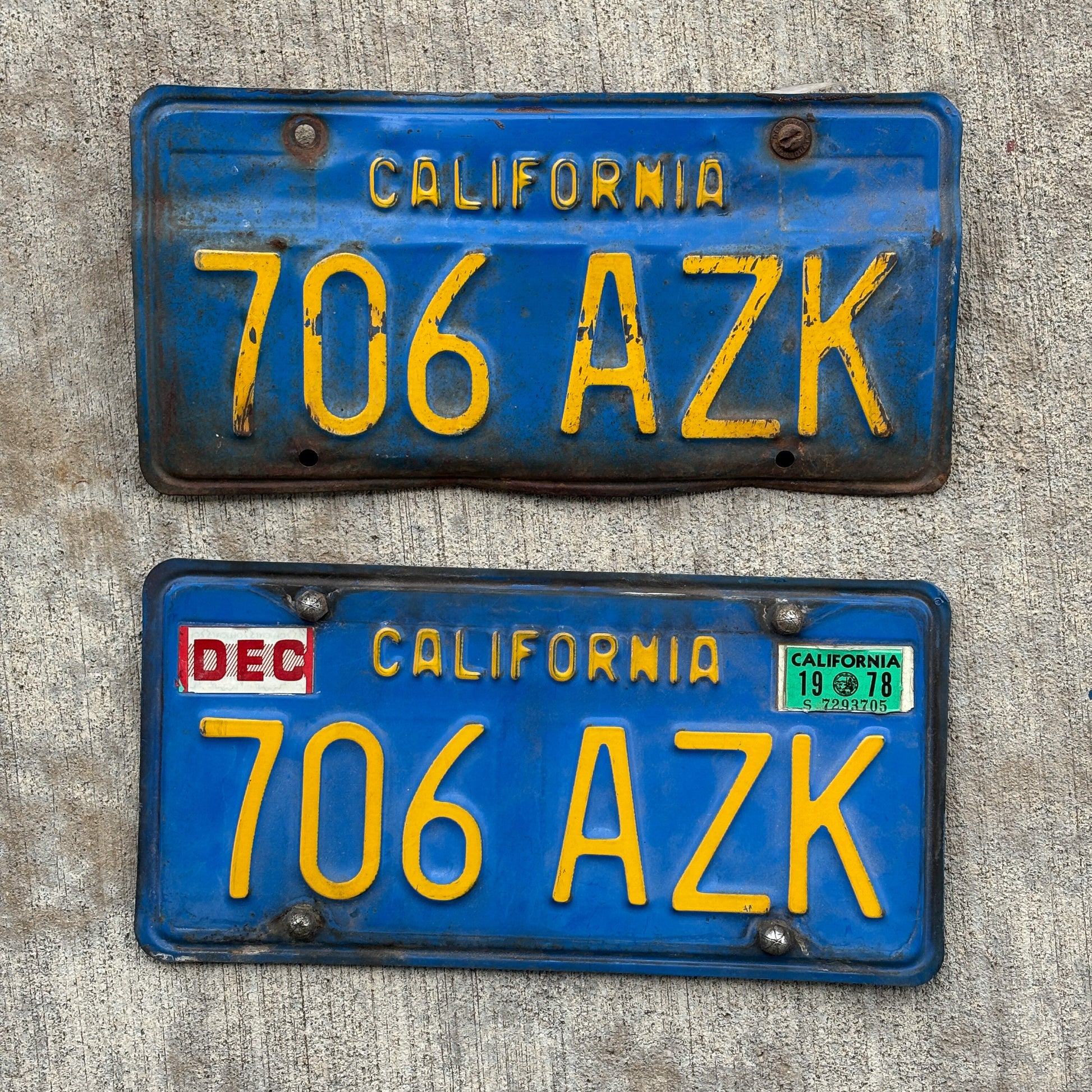 Photo of a 1970 1978 California Pair Auto Tag Garage Decor Vintage DMV Clear Number 706 AZK with original patina