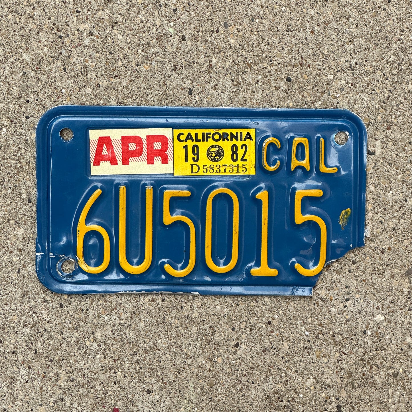 Photo of a 1970 1982 California Motorcycle License Plate Auto Tag Garage Decor Vintage 6U5015 with original patina