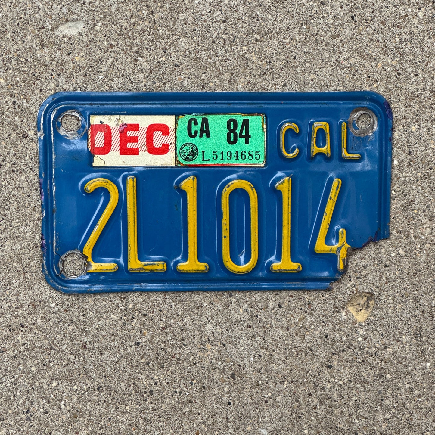 Photo of a 1970 1984 California Motorcycle License Plate Auto Tag Garage Decor Vintage 2L1014 with original patina