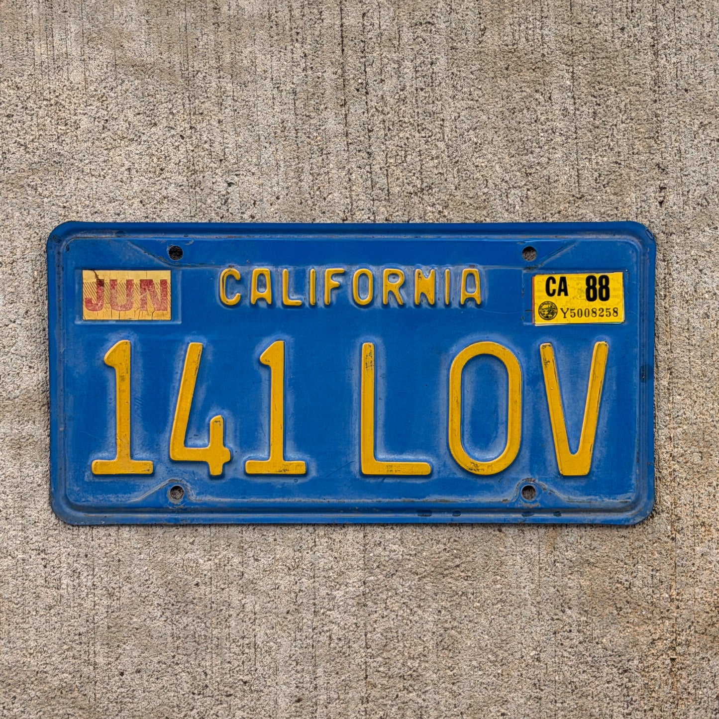 Photo of a 1970 1988 California License Plate Auto Tag Garage Decor Vintage 141 LOV with original patina