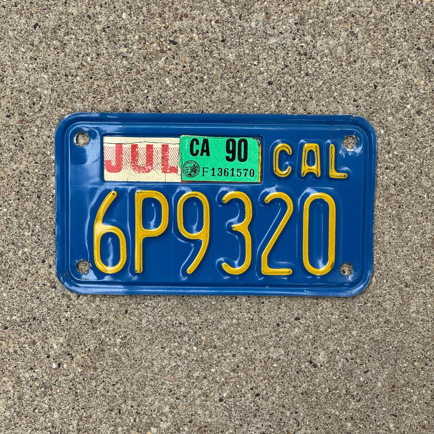 Photo of a 1970 1990 California Motorcycle License Plate Auto Tag Garage Decor Vintage 6P9320 with original patina