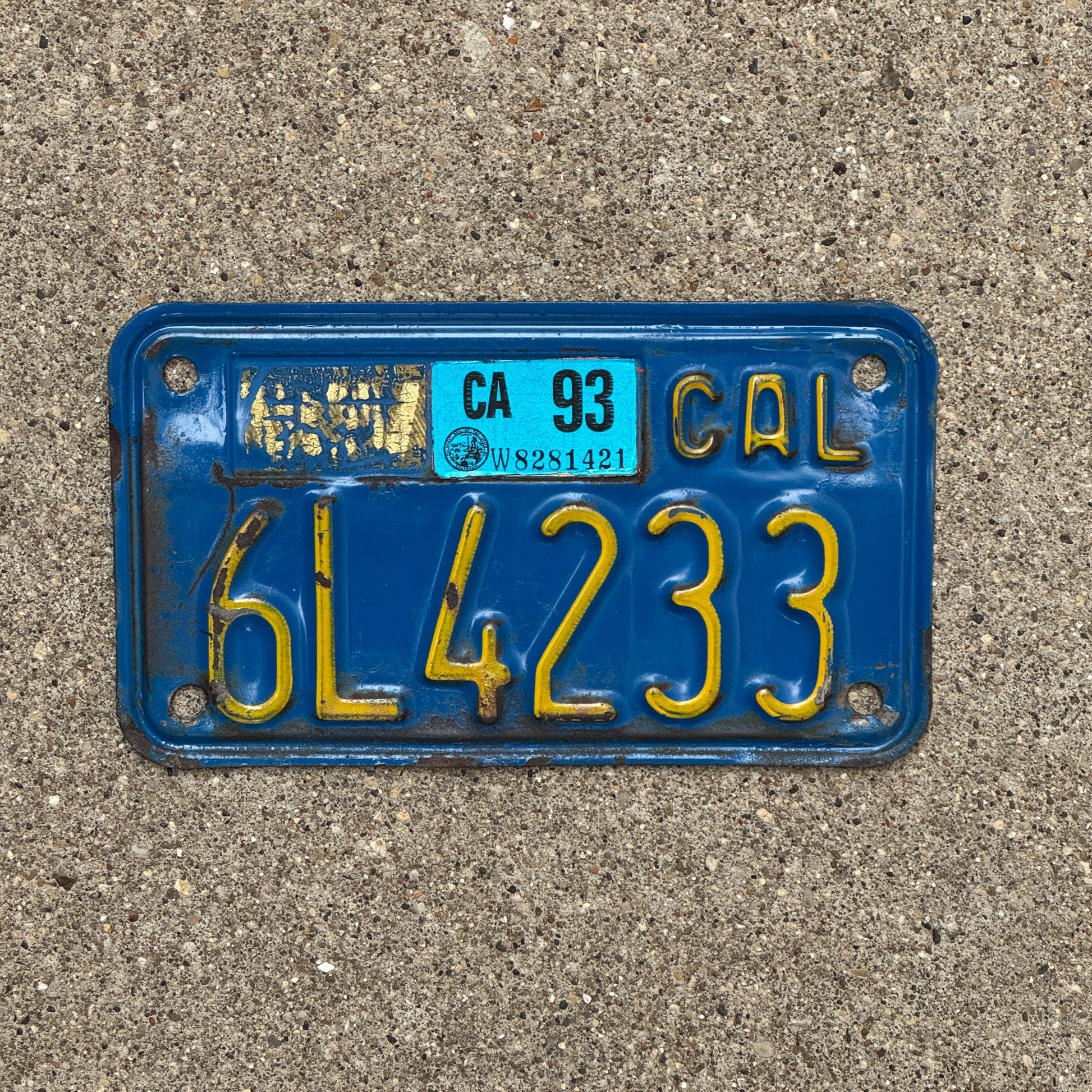 Photo of a 1970 1993 California Motorcycle License Plate Auto Tag Garage Decor Vintage 6L4233 with original patina