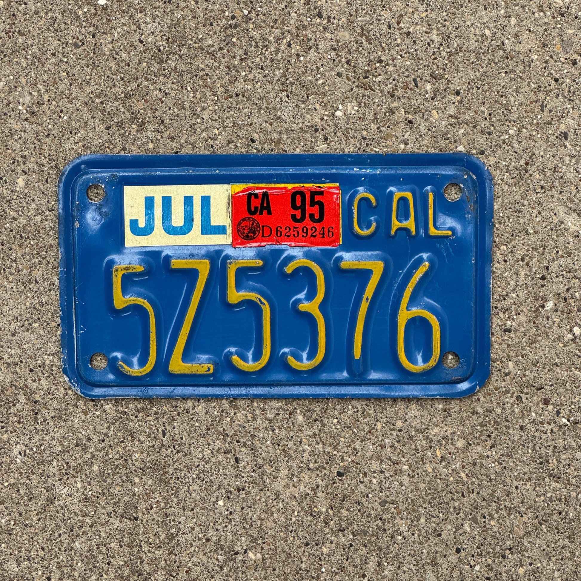 Photo of a 1970 1995 California Motorcycle License Plate Auto Tag Garage Decor Vintage 5Z5376 with original patina