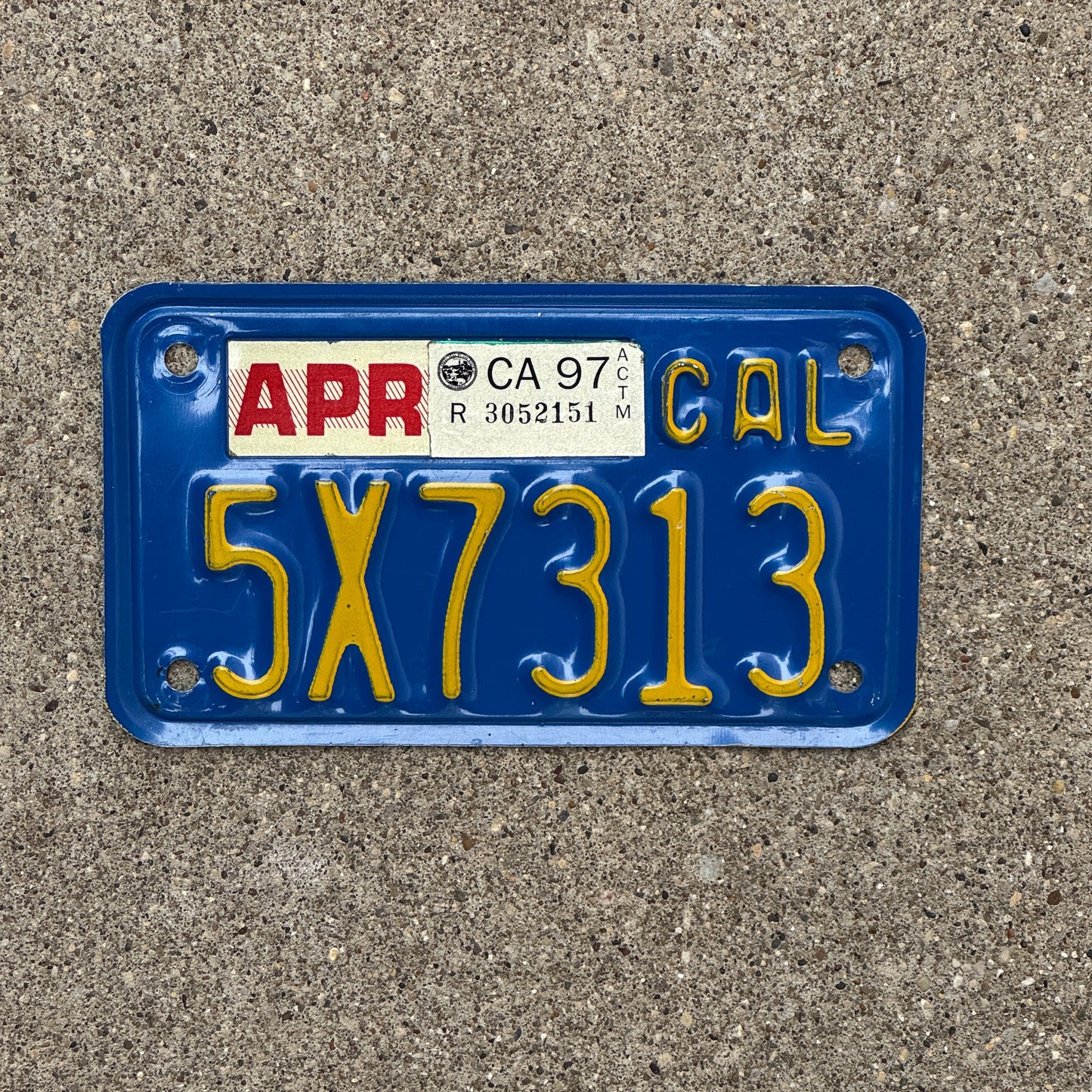 Photo of a 1970 1997 California Motorcycle License Plate Auto Tag Garage Decor Vintage 5X7313 with original patina