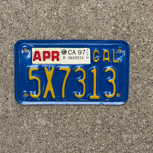 Photo of a 1970 1997 California Motorcycle License Plate Auto Tag Garage Decor Vintage 5X7313 with original patina
