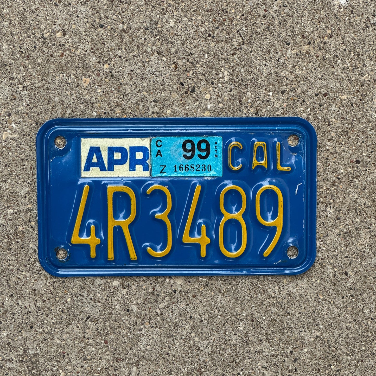 Photo of a 1970 1999 California Motorcycle License Plate Auto Tag Garage Decor Vintage 4R3489 with original patina