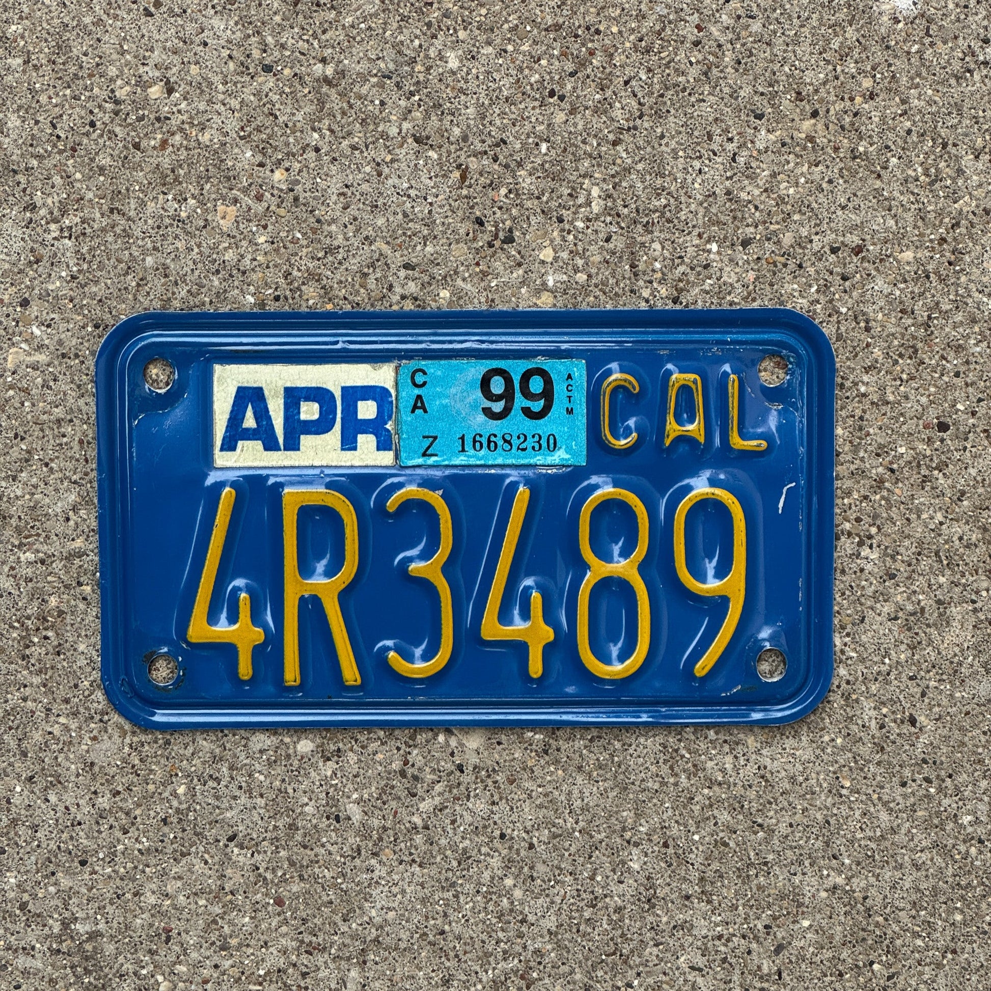 Photo of a 1970 1999 California Motorcycle License Plate Auto Tag Garage Decor Vintage 4R3489 with original patina
