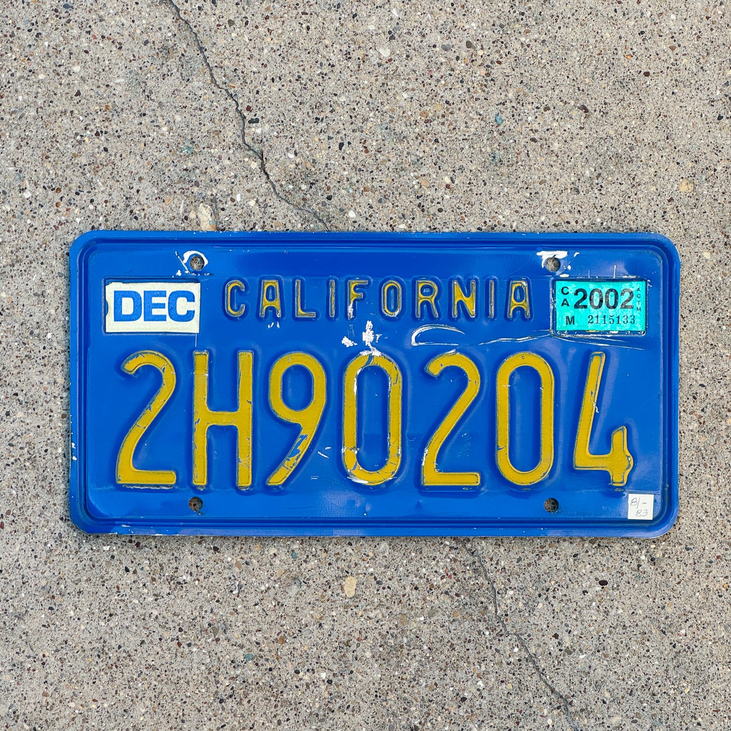 Photo of a 1970 2002 California Commercial License Plate Auto Tag Garage Decor Vintage 2H90204 with original patina