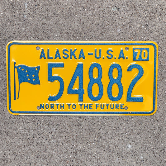 Photo of a 1970 Alaska License Plate Auto Tag Garage Decor Vintage Pink Back Type 54882 with original patina