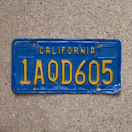 Photo of a 1970 California License Plate Auto Tag Garage Decor Vintage 1 AQD 605 with original patina