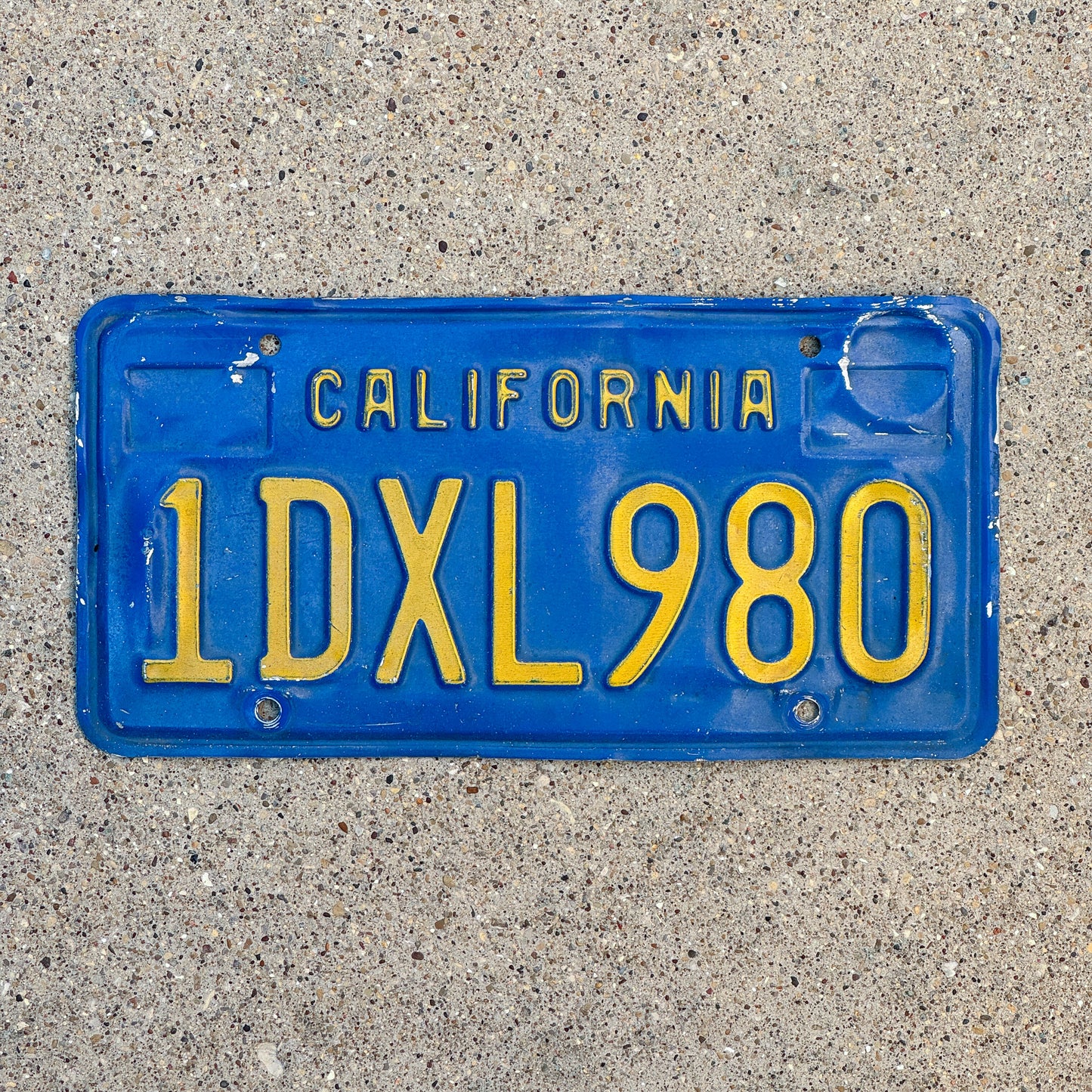 Photo of a 1970 California License Plate Auto Tag Garage Decor Vintage 1 DXL 980 with original patina
