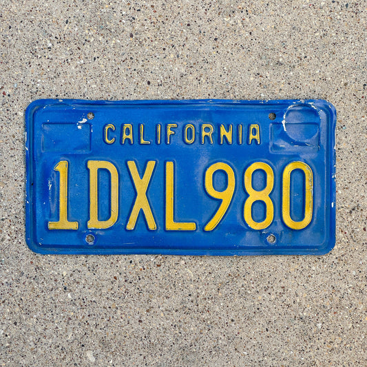 Photo of a 1970 California License Plate Auto Tag Garage Decor Vintage 1 DXL 980 with original patina