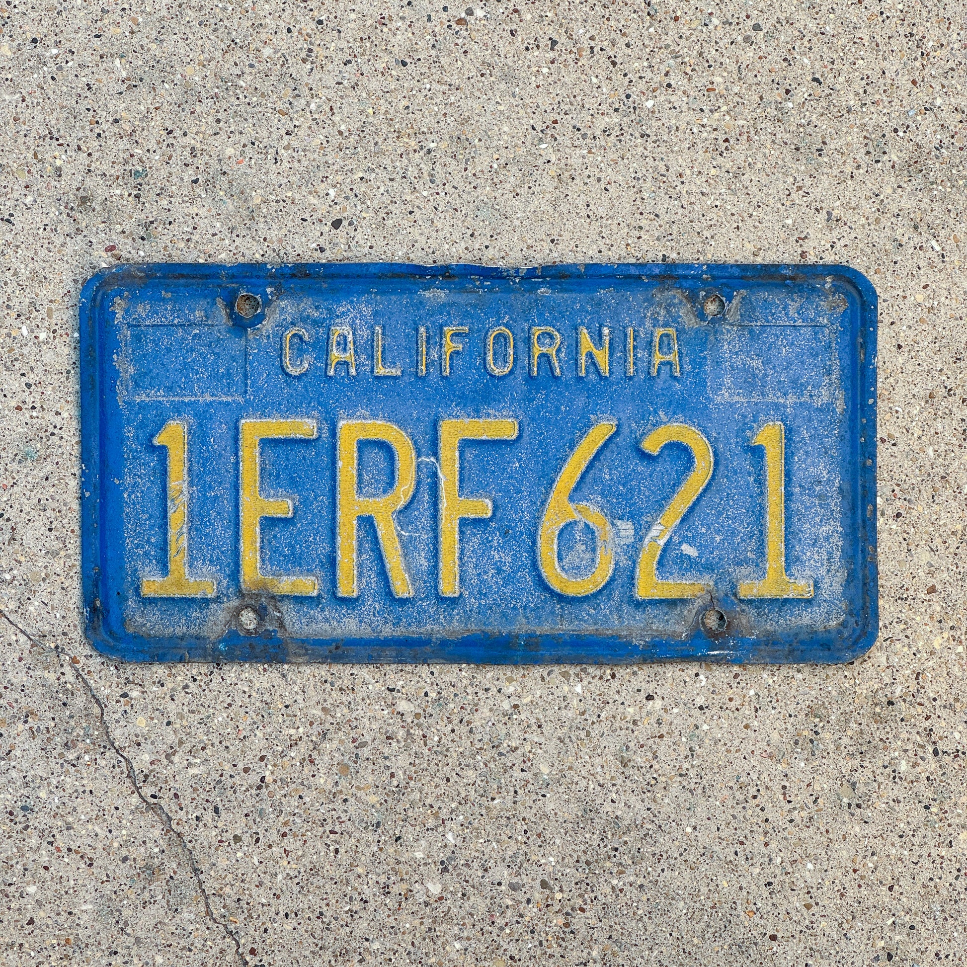 Photo of a 1970 California License Plate Auto Tag Garage Decor Vintage 1 ERF 621 with original patina