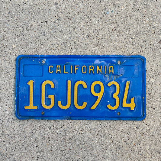 Photo of a 1970 California License Plate Auto Tag Garage Decor Vintage 1 GJC 934 with original patina