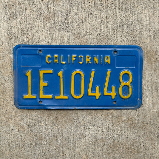 Photo of a 1970 California License Plate Auto Tag Garage Decor Vintage 1E10448 with original patina
