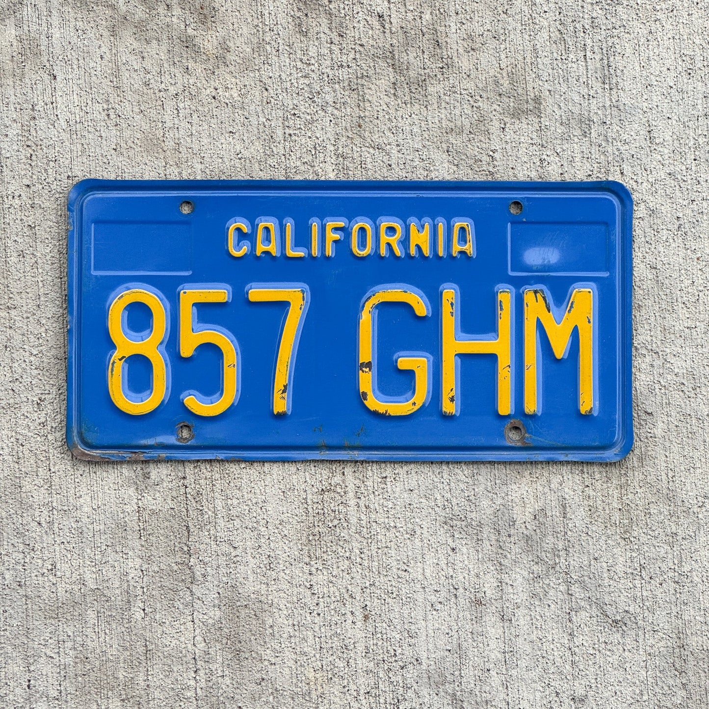 Photo of a 1970 California License Plate Auto Tag Garage Decor Vintage 857 GHM with original patina