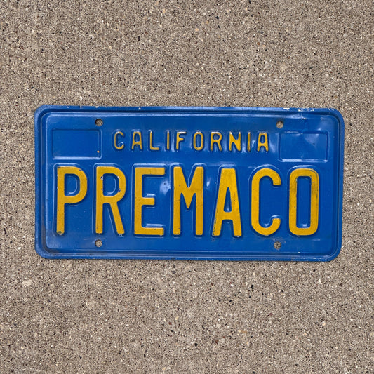 Photo of a 1970 California Vanity License Plate Auto Tag Garage Decor Vintage PREMACO with original patina