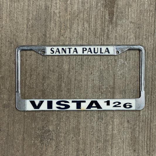 Photo of a 1970 Era California License Plate Frame Auto Tag Garage Decor Vintage Ford Metal Santa Paula Vista 126 with original patina
