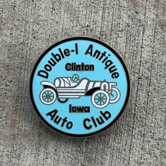 Photo of a 1970 Era Double I Antique Auto Club Clinton Iowa Badge Emblem License Plate Topper Auto Tag Garage Decor Vintage with original patina