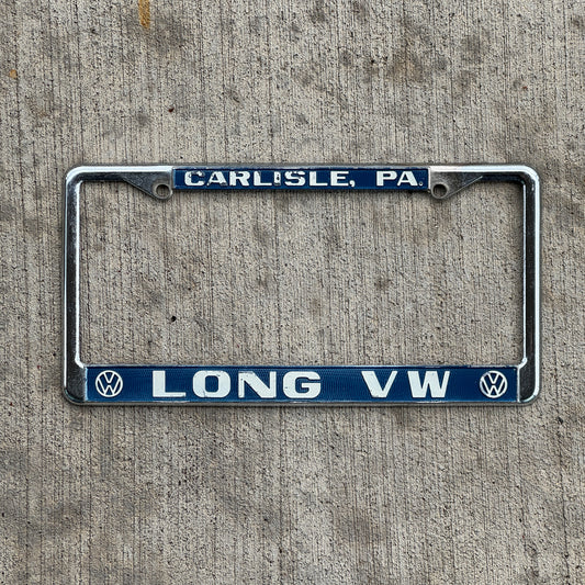 Photo of a 1970 Era Lloyd Long Volkswagen Carlisle Pennsylvania License Plate Frame Auto Tag Garage Decor Vintage VW Dealer with original patina