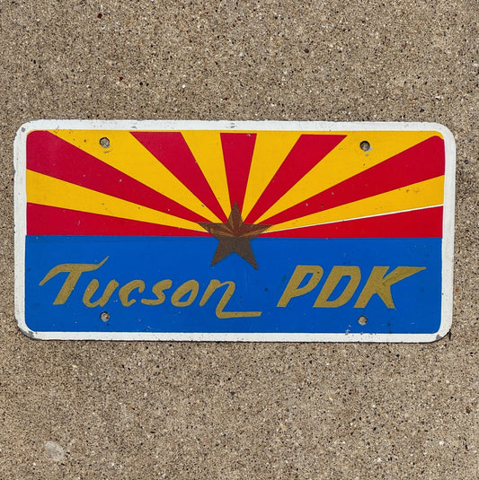 Photo of a 1970 Era Tucson Arizona Booster License Plate Auto Tag Garage Decor Vintage PDK Phi Delta Kappa ? Gold Star Tucson PDK with original patina