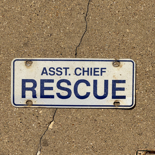 Photo of a 1970 Era Assistant Chief License Plate Topper Auto Tag Garage Decor Vintage RESCUE