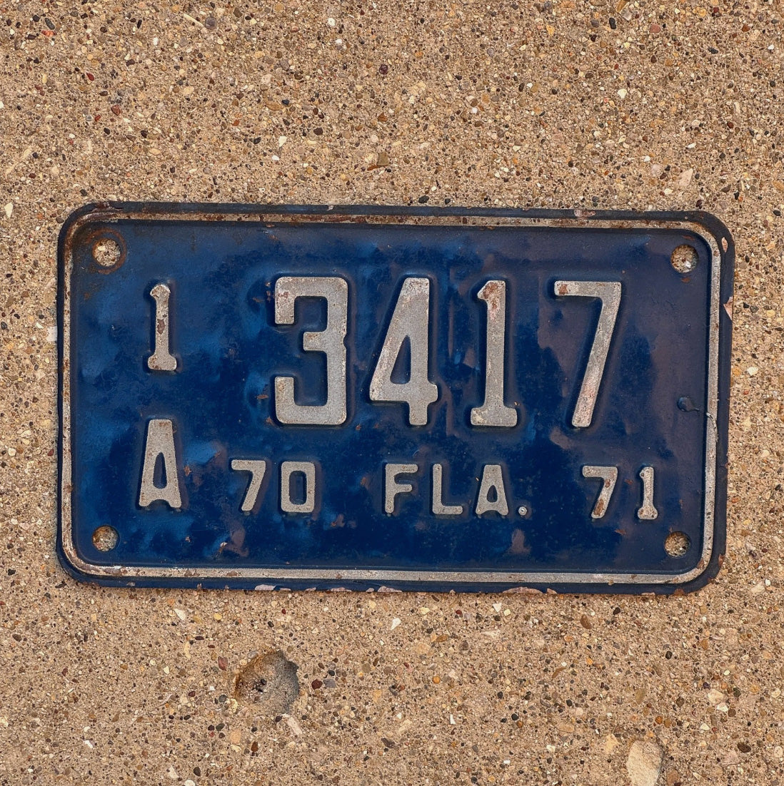 Photo of a 1970 Florida Motorcycle License Plate Auto Tag Garage Decor Vintage 1 A 3417 with original patina