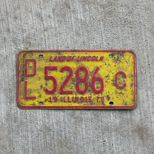 Photo of a 1970 Illinois Dealer License Plate Auto Tag 1 Vintage Garage 5286 C with original patina