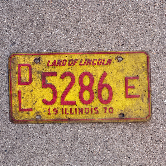 Photo of a 1970 Illinois Dealer License Plate Auto Tag 1 Vintage Garage 5286 E with original patina