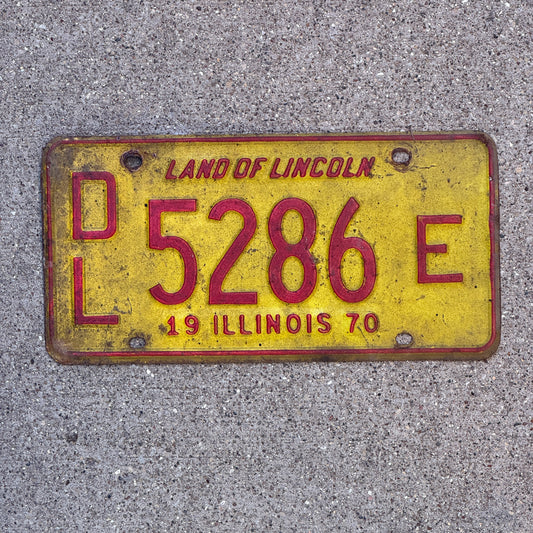 Photo of a 1970 Illinois Dealer License Plate Auto Tag 2 Vintage Garage 5286 E with original patina