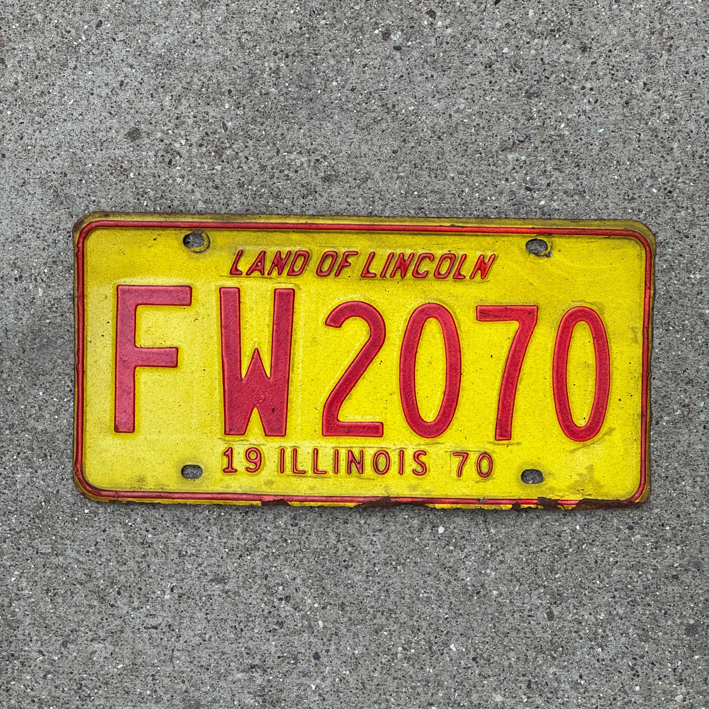 Photo of a 1970 Illinois License Plate Auto Tag 1 Vintage Garage FW 2070 with original patina