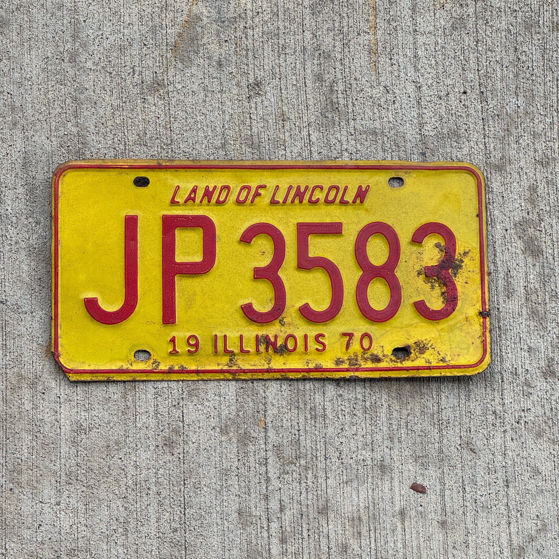 Photo of a 1970 Illinois License Plate Auto Tag 1 Vintage Garage JP 3583 with original patina